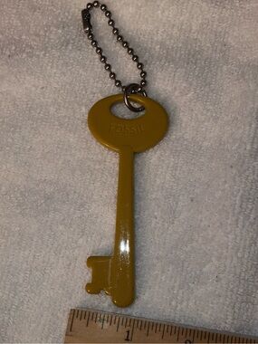 Fossil skeleton key mustard yellow plastic charm fob metal ball chain